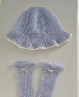 Handmade crochet mohair bucket hat in baby blue with cream trim