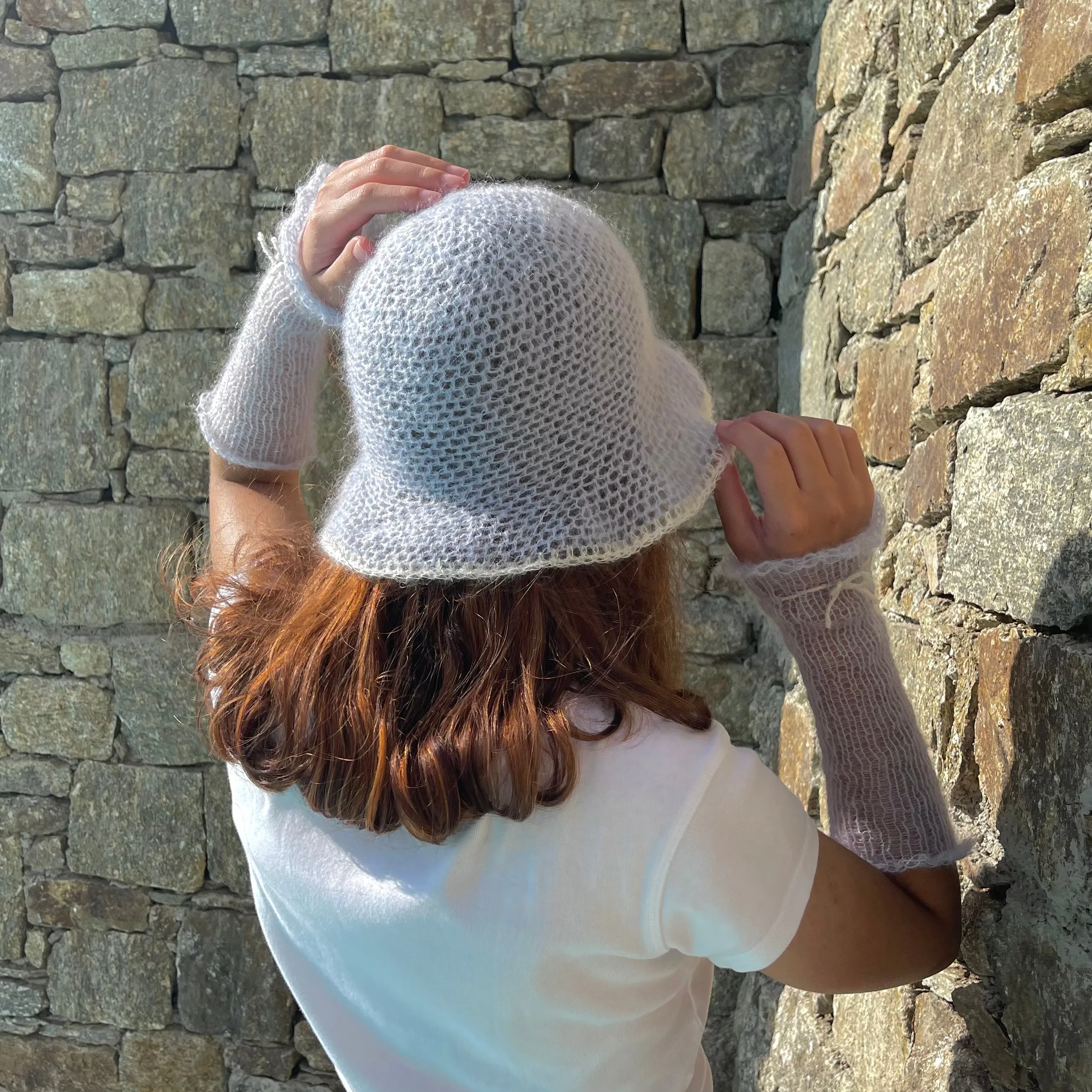 Handmade crochet mohair bucket hat in baby blue with cream trim