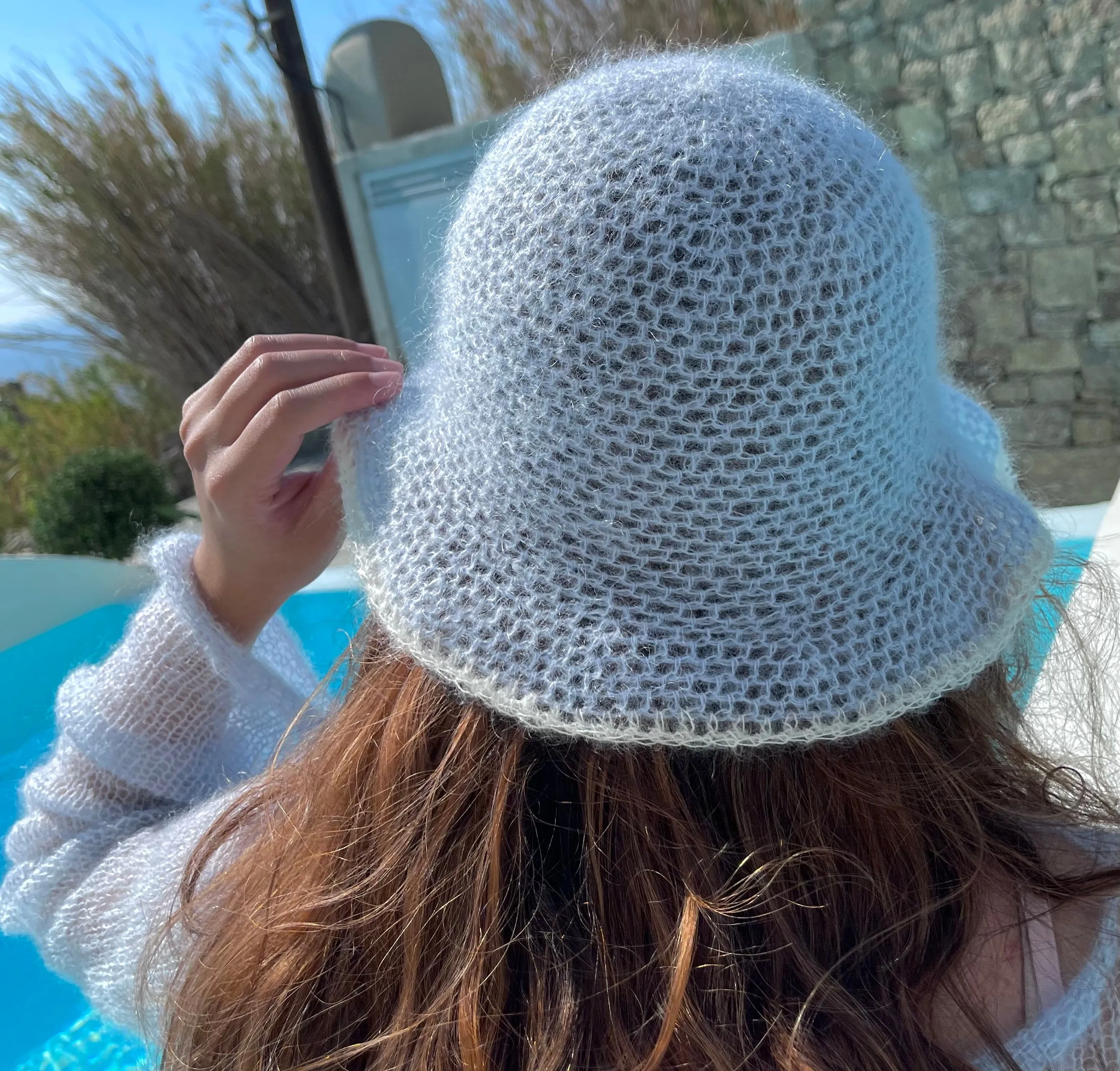 Handmade crochet mohair bucket hat in baby blue with cream trim