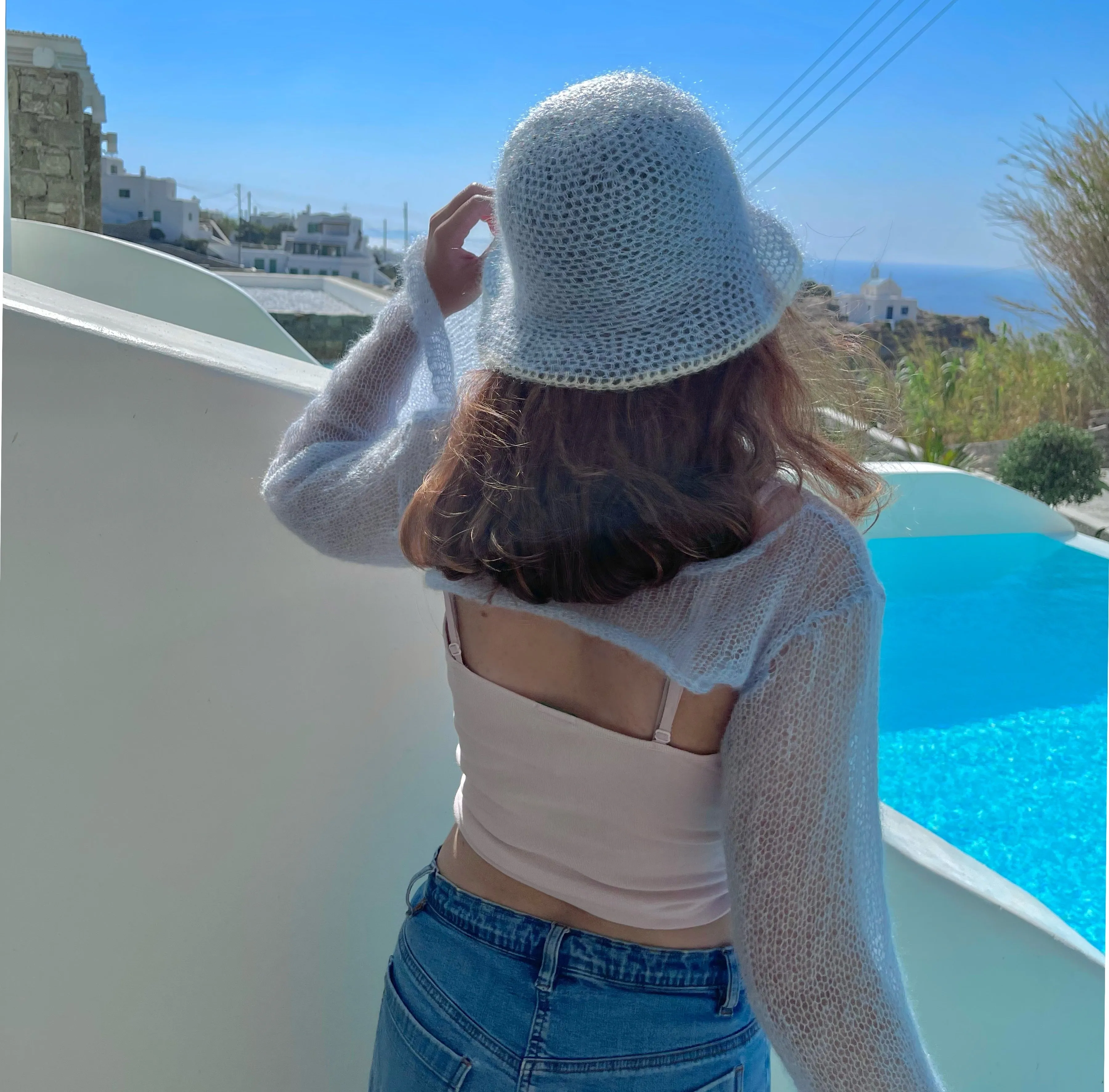Handmade crochet mohair bucket hat in baby blue with cream trim
